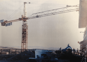 Old photo of crane on construction site